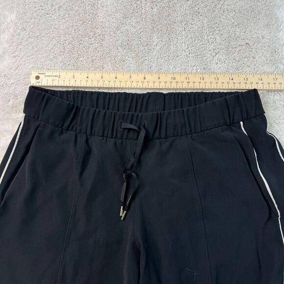 Lululemon On The Right Track Womens Pants Black Loose Fit Slit Hem Size 10 - Picture 7 of 11